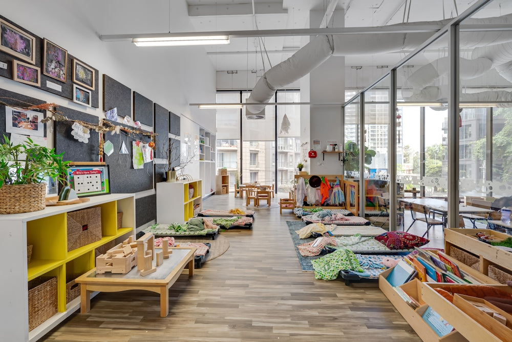 A room filled with lots of furniture and lots of windows