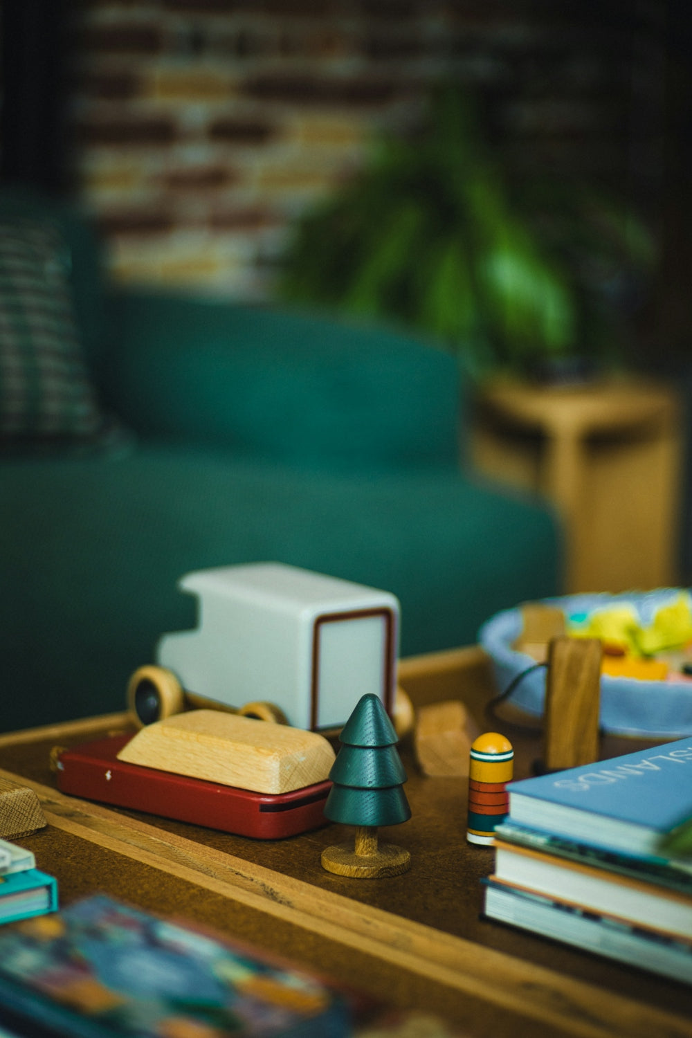 Wooden toys and books on a coffee table