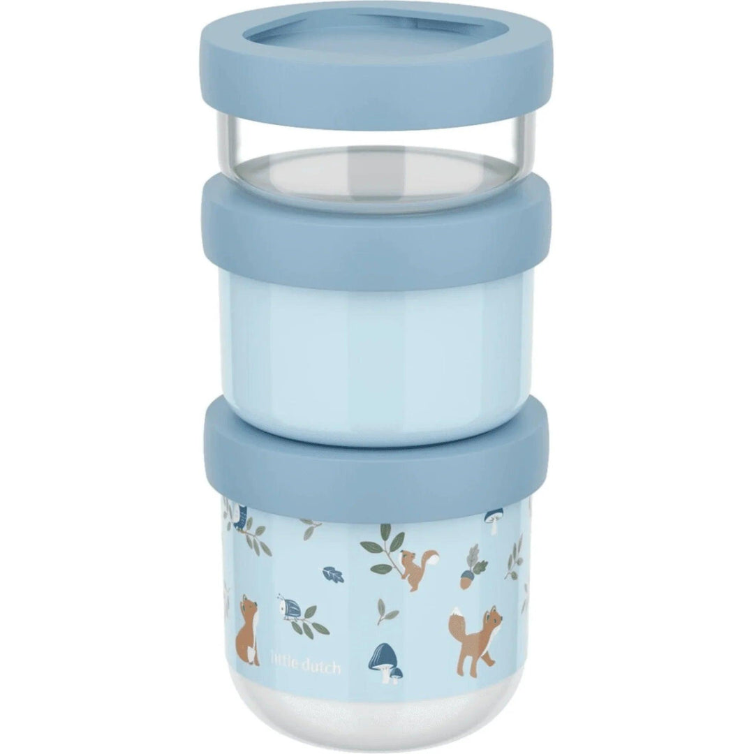Set di contenitori con illustrazioni di volpe, scoiattolo e fungo su sfondo blu, perfetti per gli spuntini
