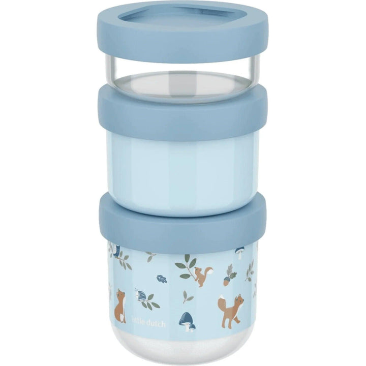 Set of containers with fox, squirrel and mushroom illustrations on a blue background, perfect for snacks