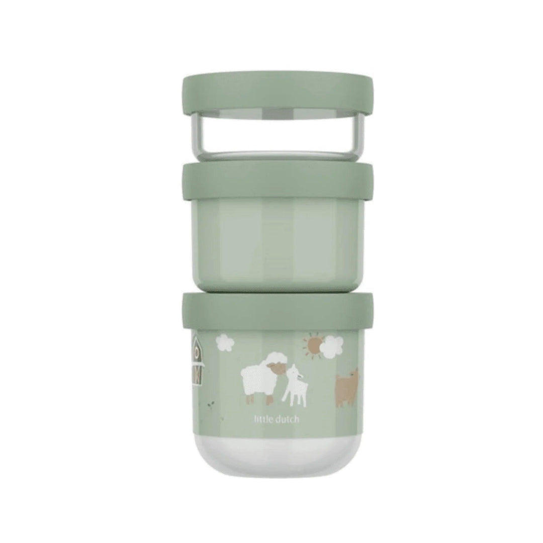 Set de tres recipientes apilables con ilustraciones de ovejas y granja, ideal para snacks o frutas