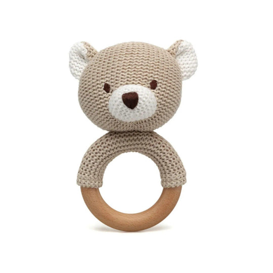Baby teether with knitted teddy bear head and natural wood ring.