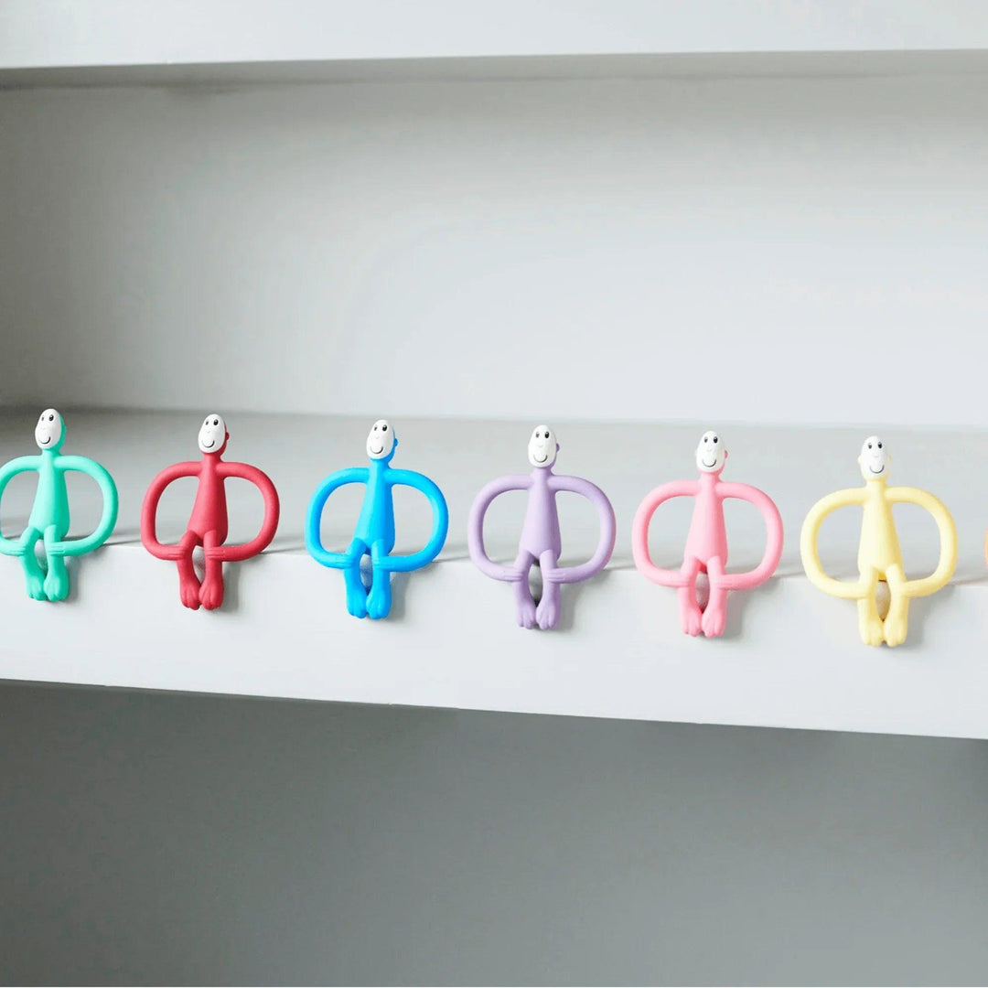 Anneaux de dentition en silicone Matchstick Monkey pour bébés en huit couleurs différentes, style arc-en-ciel