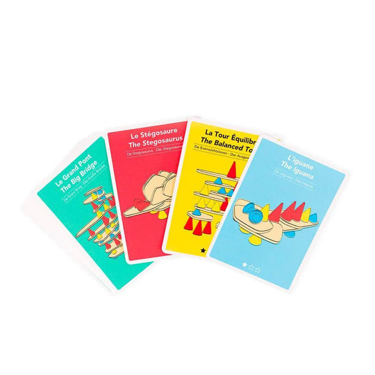 Cartes de défi du jeu de construction Piks avec des motifs en rouge, jaune, bleu et vert, montrant différentes structures créatives