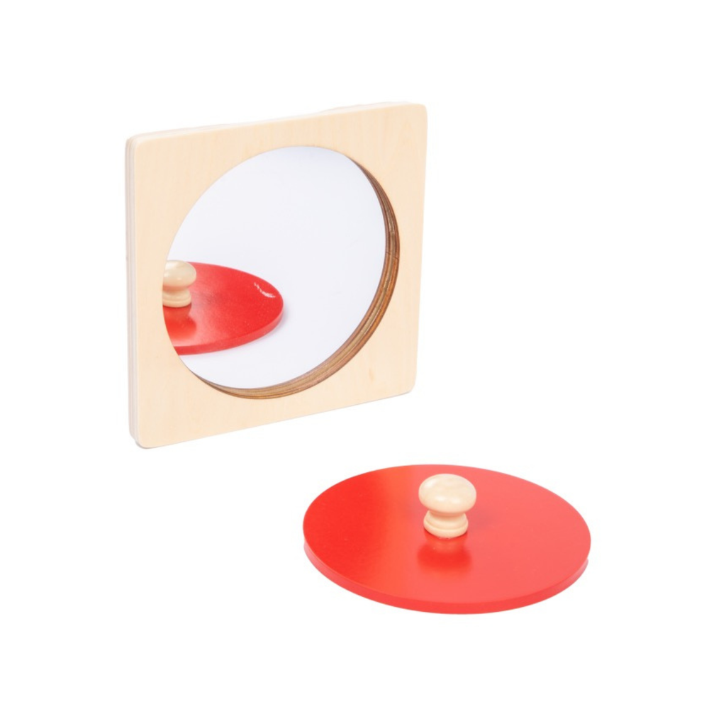 Puzzle Montessori de madera con base y pieza circular con pomo para encajar.