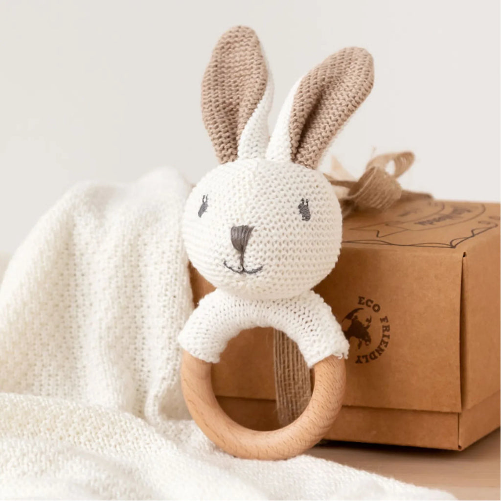 Woven rabbit teething rattle with natural wooden hoop, eco-friendly design for babies