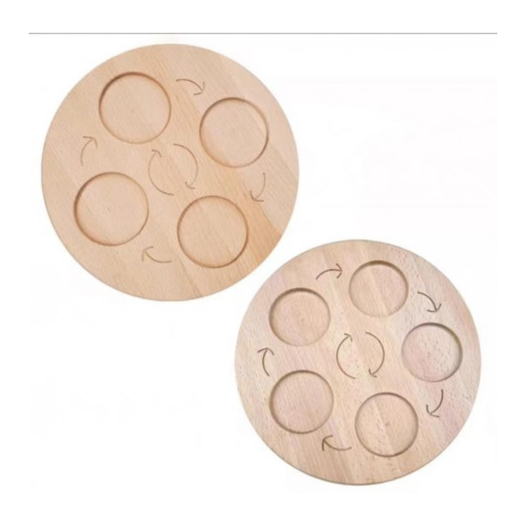 Tablero circular de madera con cavidades y flechas para ordenar etapas del ciclo de vida.
