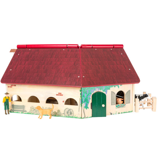 La construcción de madera de la granja juguete está dispuesta en forma de ángulo  y equipada con un techo plegable.