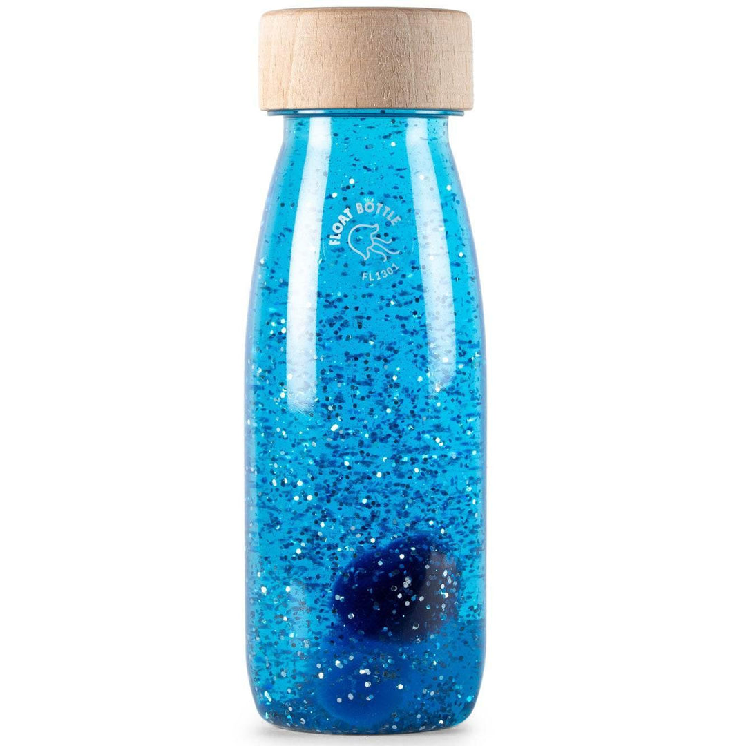 BOUTEILLE SENSORIELLE FLOTTANTE aux couleurs variées. L'arc-en-ciel à portée de main. Avec ces bouteilles, inspirées de la palette chromatique de la nature, les enfants découvrent les couleurs, s'émerveillent de la lumière, stimulent leur concentration et trouvent leur moment de calme. Ne pas immerger dans l'eau ni exposer au soleil pendant une longue période. Pour des raisons d'hygiène, nous recommandons de les essuyer avec un chiffon ou une lingette humide.