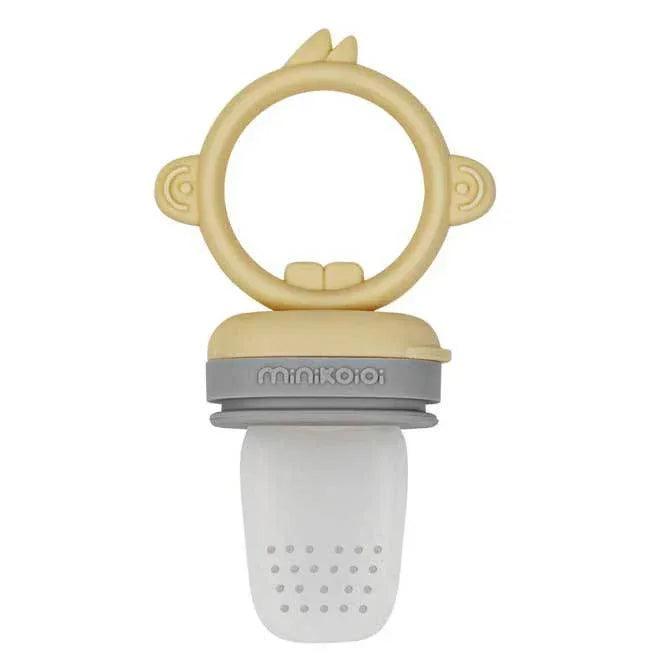 Silicone feeder, in grey and pastel yellow.