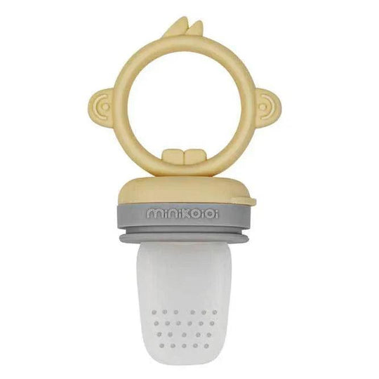 Silicone feeder, in grey and pastel yellow.