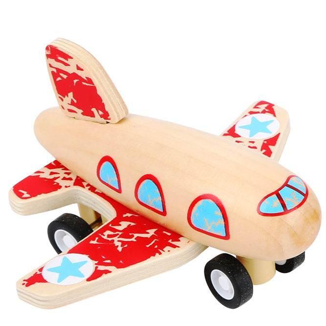 Aeroplano rosso in legno con meccanismo retrattile che si muove nella cameretta del bambino su quattro ruote in gomma, garantendo un volo veloce, divertente ed emozionante. Realizzato in legno certificato FSC.
