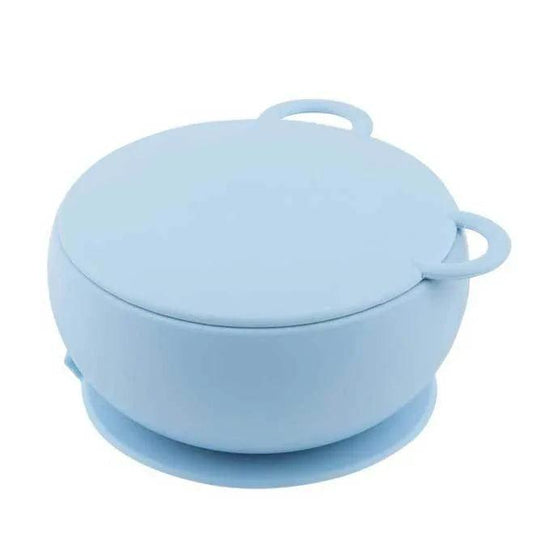 Silicone bowl with suction cup base and pastel blue color.
