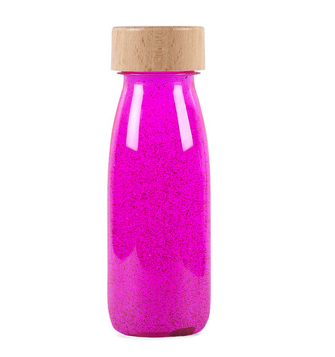 botellas con pigmentos fluorescentes y fosforescentes de color fucxia