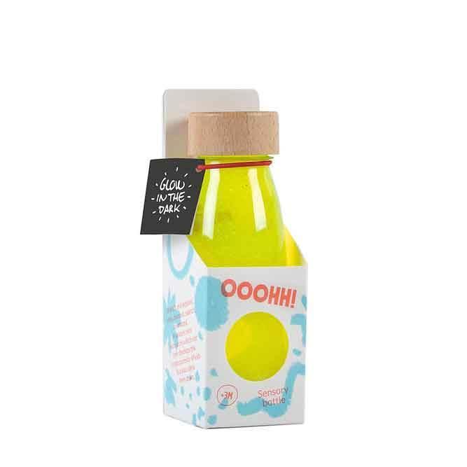 Juguete botella sensorial para los niños. Color amarillo fluor. 