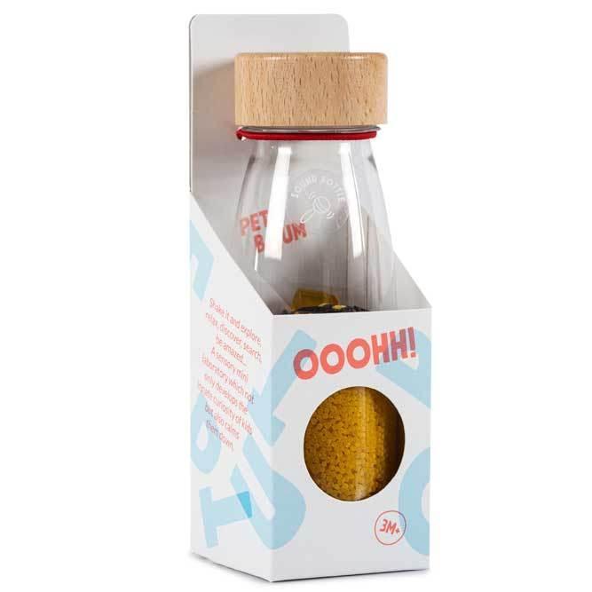 Bouteille sensorielle, à l'intérieur vous trouvez des abeilles et du pollen, créant un environnement.