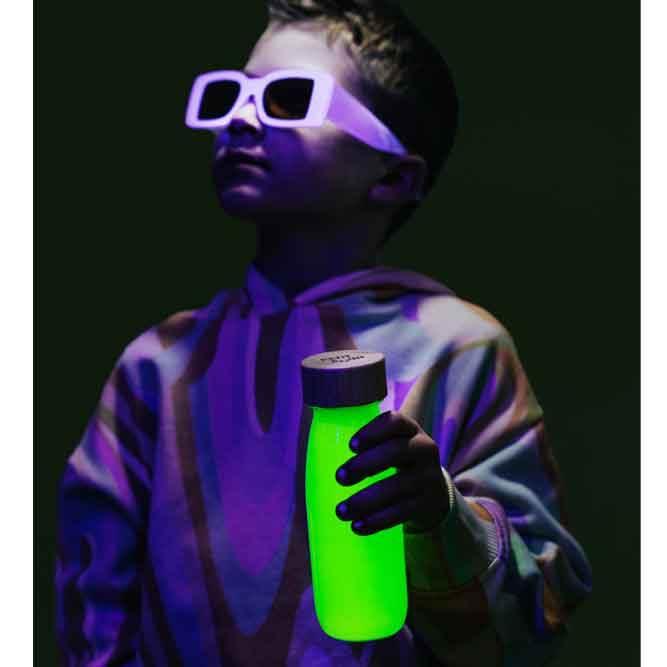 Juguete botella sensorial para los niños. Color amarillo fluor. 