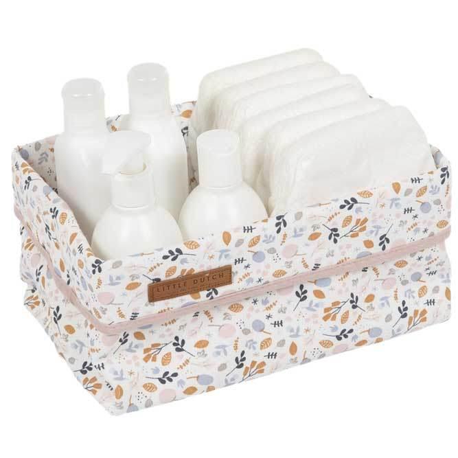 Cesta modelo grande de tela estampada en colores suaves y motivo floral. Ideal para poner los pañales y accesorios necesarios para la higiene del bebe.