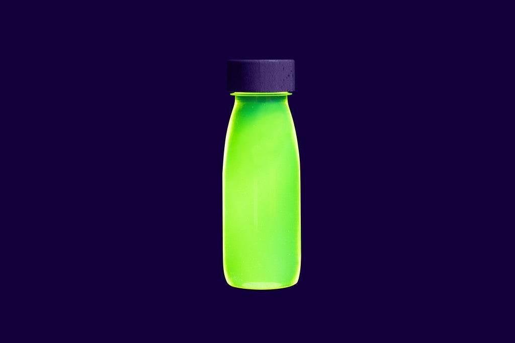Juguete botella sensorial para los niños. Color amarillo fluor. 