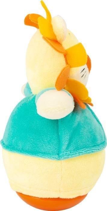 León de peluche con base tambaleante visto de lado – textura suave y colores estimulantes para bebé