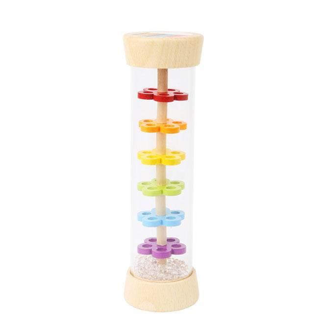 Giocattolo RAIN BAR, sonaglio. Per bambini da 0 a 1 anno. Lo stantuffo in plastica trasparente della barra antipioggia offre una visione chiara delle perle di vetro che filtrano attraverso le sei piastre colorate perforate a forma di fiore.